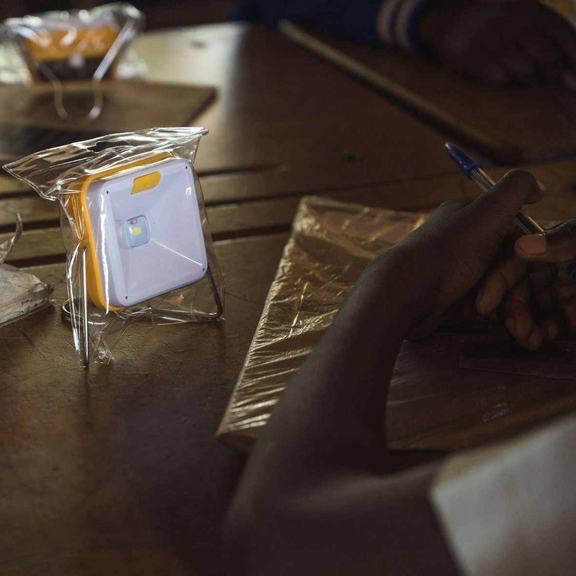 Children in Bulawayo holding solar study lights